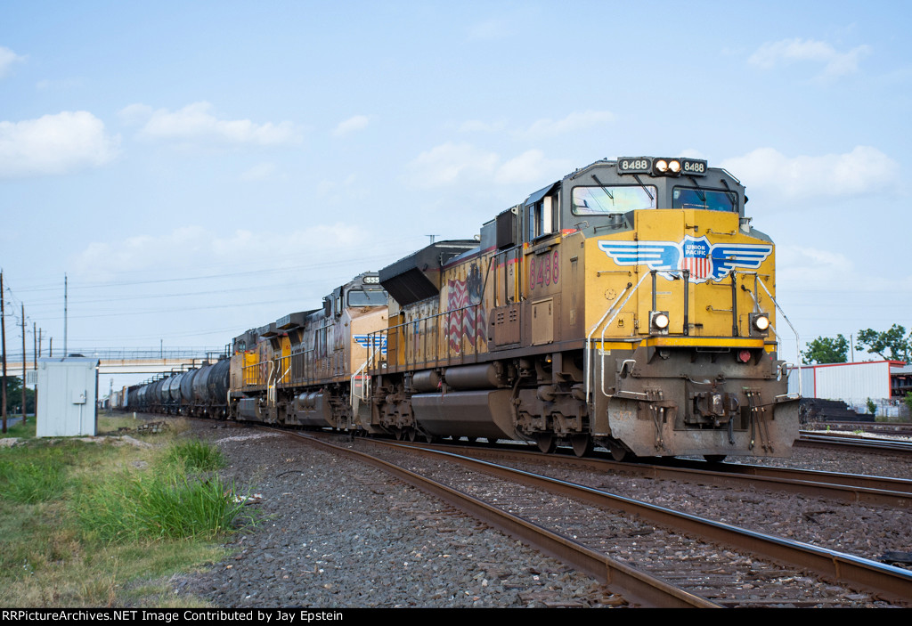 UP 8488 leads a manifest towards the BNSF Diamond